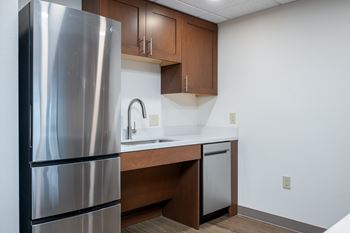 Fully equipped kitchens with refrigerator, dishwasher, over/stove